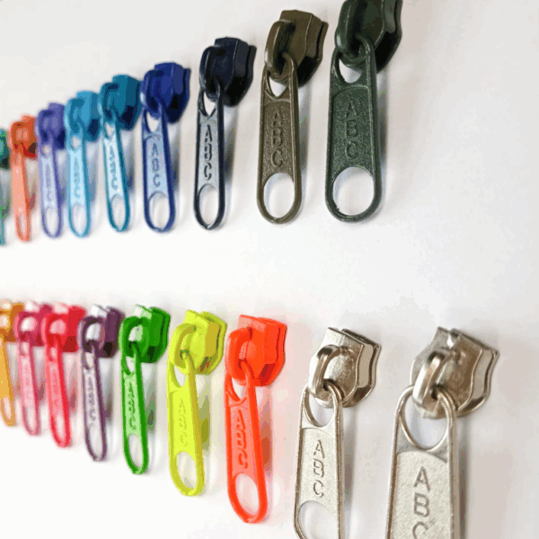 LLAVES O DESLIZADORES NAILON ABC